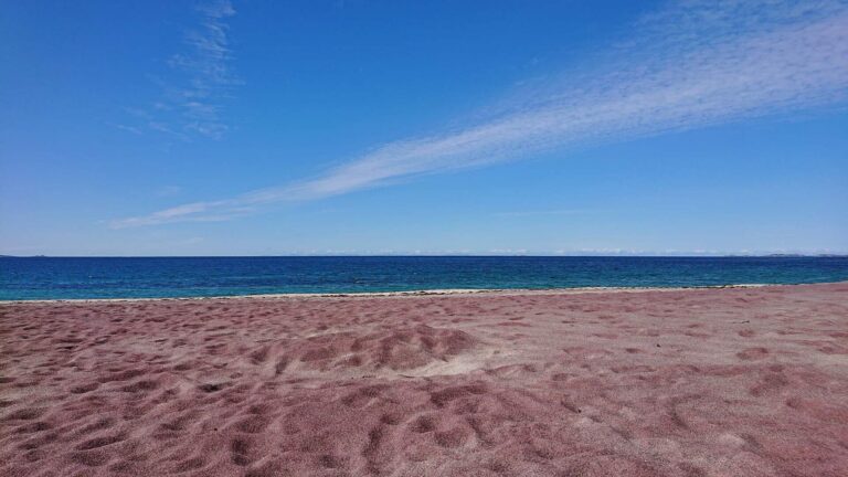 Blue sky and red sand Mjelle beach of Bodø
